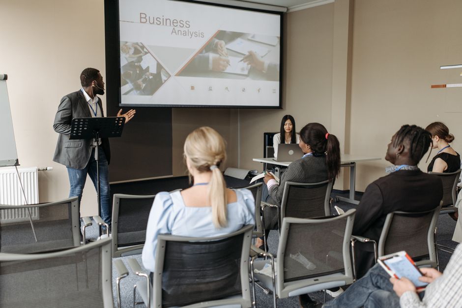 Professionals in a compliance seminar